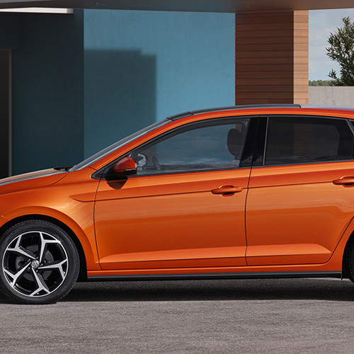 VW Polo, Seitenansicht, stehend, orange